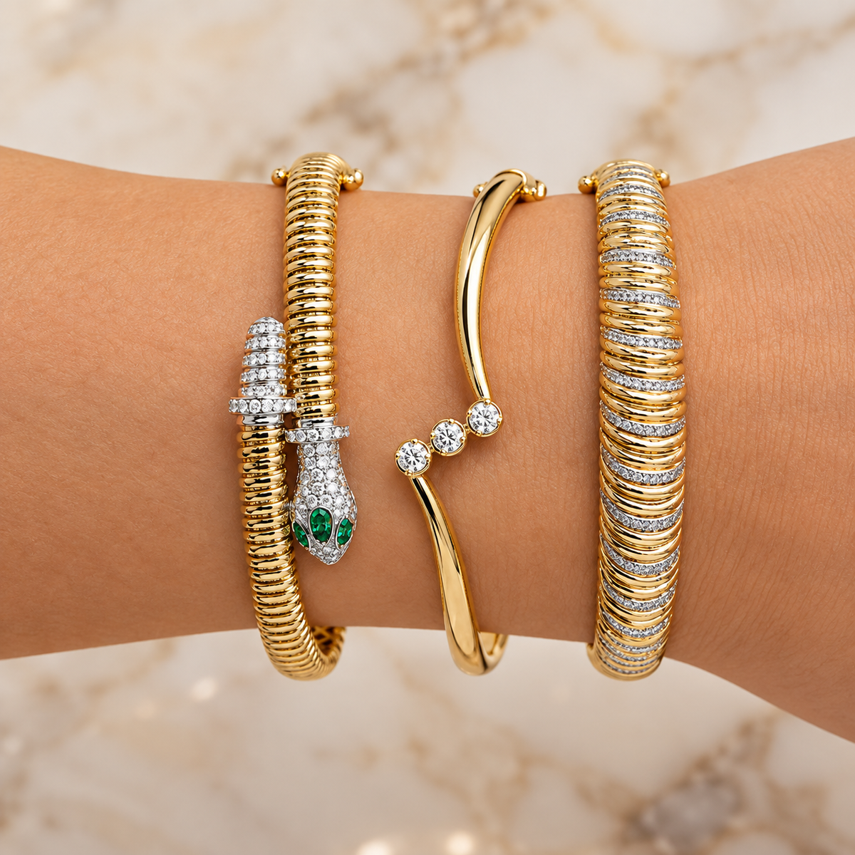 0.74CT DIAMOND & 0.12CT EMERALD 14K2T Y/W RIBBED SNAKE BANGLE